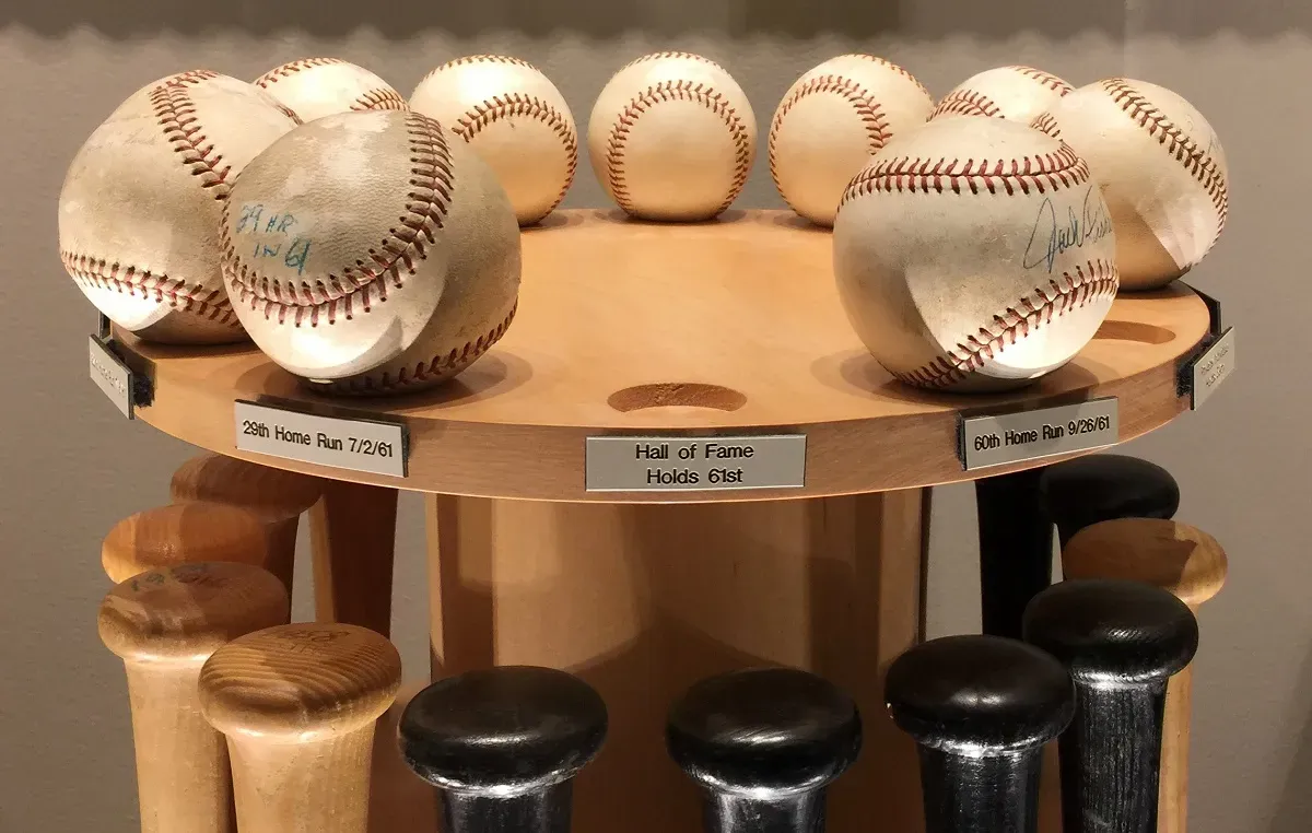A few of the baseballs he hit for his record 61 home run season.